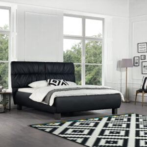 Gestoffeerd bed Sofia in zwart kunstleder met wit opgemaakt beddengoed