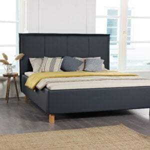 Gestoffeerd bed model 'brussel' donkerblauwe kleur in slaapkamer