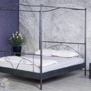 Metalen bed Laura zwart met opgemaakt bed
